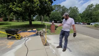 PUTTING A DRAINAGE PIPE IN THE DRIVEWAY