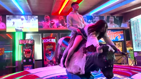 Benidorm Bull Ride: Couple's Exciting Bull-Riding Escapade