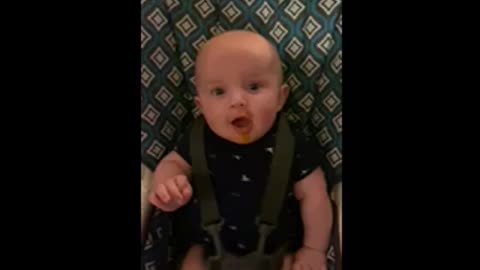 Baby Lincolns first bite of real gerber