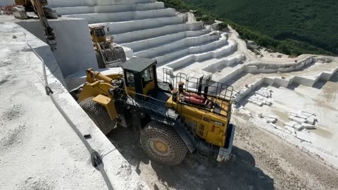 Komatsu WA900 And Caterpillar 992D Wheel Loaders Working On Birros Marble Quarries