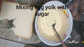 Mixing egg yolk with sugar - OzFlor
