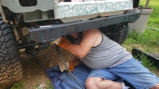 Allen Attempting to Weld on his Jeep