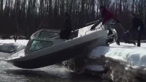 Launching Boat on Snow
