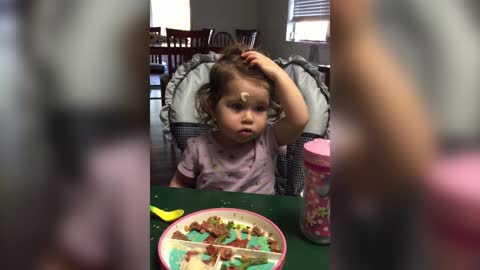 Cute Baby Can't Wipe Mashed Potatoe From Face