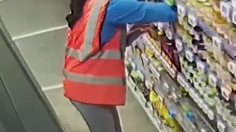 Girl With Great Reflexes Subconsciously Catches Shelf Product Before It Falls