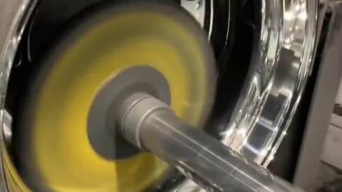 Automobile wheel hub grinding and polishing