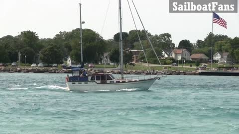 Gentle Breeze Sailboat Cruising Up St Clair River In Great Lakes