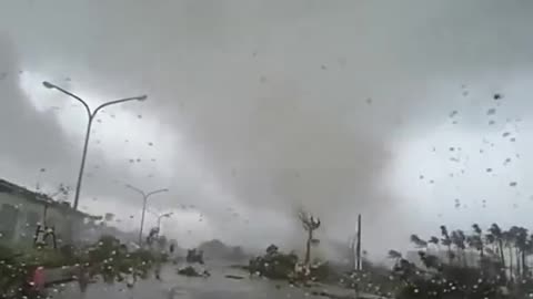 Woman Appears to Be Thrown Out of a Tornado