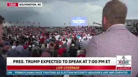 RALLY DELAYED President Trump speaks to Wilmington supporters over the phone as North Carolina rally