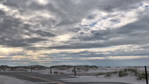 Clouds Move Over the Sand Dunes - Timelapse