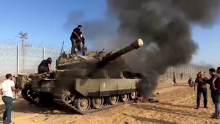 Purported captured Israeli military vehicle driven into Gaza