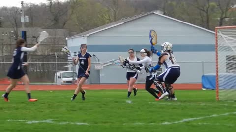 Erin-Lacrosse goal - Aquinas Academy April 2015
