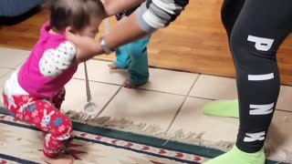 Twins working on first steps