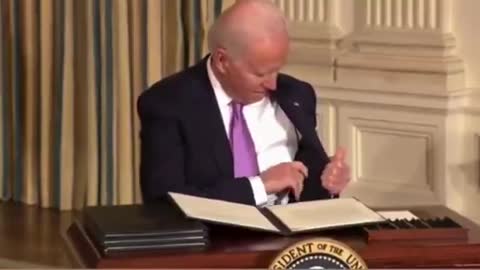 Joe Biden Gets Lost Putting His Pen In His Pocket After Signing Order