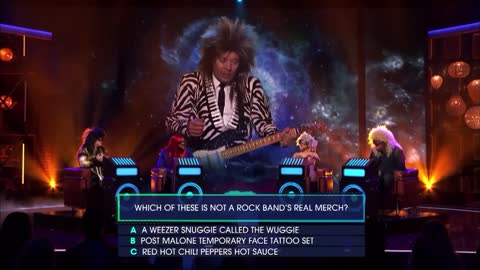Air guitar quizz with Ariana Grande, Blake Shelton, Kelly Clarkson and John Legend