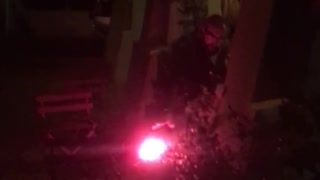 Guy sets off fireworks near people eating