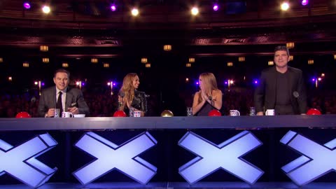 Talking dog with his owner Marc Metral wow the judges in Britain Got Talent