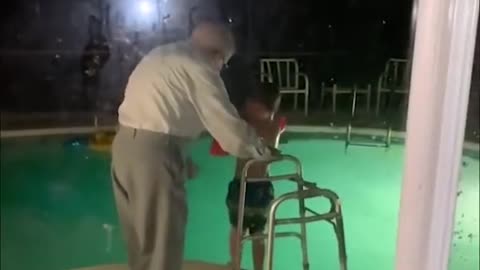 Great grandfather held on to the walker and kicked his great grandson standing b