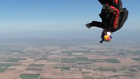Skydiving & use of a parachute for adventure.