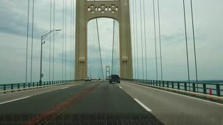Crossing the Mackinac bridge by a car.