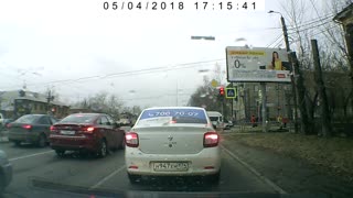 Billboard Falls on Pedestrians in High Wind