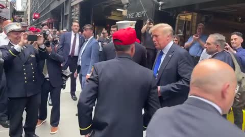 Donald Trump greeted by first responders at Ground Zero