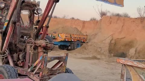 Belarus 510 converter into Loader showell loading sand into a 13 foot jack trolley | pakistan