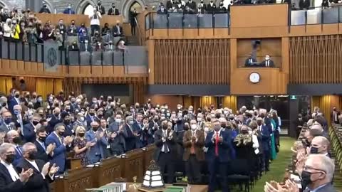 Virtue signalling fully masked Canadian parliament listens to Zelensky livestream