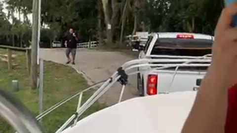 Truck Follows Boat Into Water