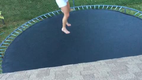 Back Flip on Trampoline Sends Girl to the Ground