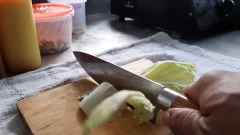 Chopping the vegetables.