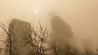 Beijing chokes in dust storm