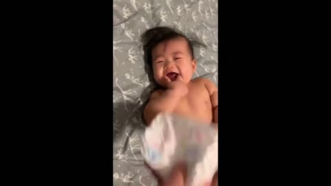 Baby try to laugh