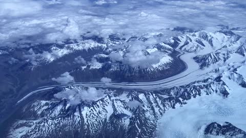 Beautiful Plane View of Snowy Mountains of Canada