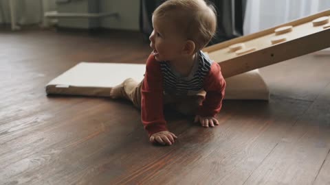 A Little Boy Crawling on the Floor Uploaded at June