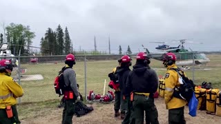 Rain helps stall wildfire near Canadian oil city