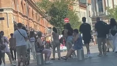 Pedestrians Picnic On Lowerable Barriers