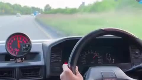 A police officer chase a car doing race