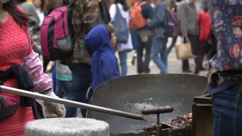 Cooking Chestnuts at Street Stall