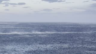 Strong Winds Push Waves Away From Shoreline