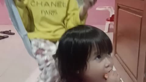 cute child is eating and praying