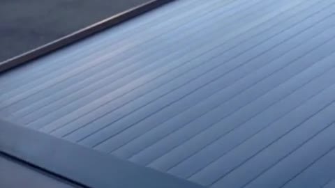 Rollbak Tonneau Retractable Bed Cover - Rolls Up When Braking or Stopping