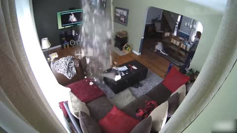 man destroys ceiling during renovation