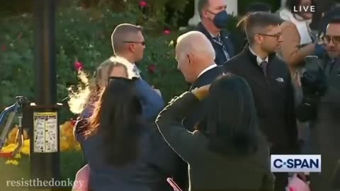 Young Girl Uses Karate Block To Stop Biden From Touching Her