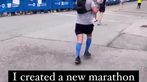 Husband Carries Daughter Over Finish Line