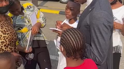 Singer, Moses Bliss Celebrates Children's Day with Children on the street of Lagos