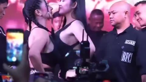 Asian Fighters Chest Bumping Each Other