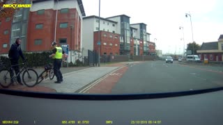 Biking Policeman Takes a Tumble Chasing Criminal