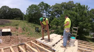 Floor trusses, concrete sealer, and start the decking