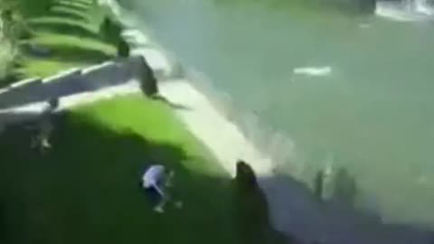 CCTV footage captured people running for cover in Ukrainian park